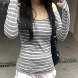 Striped Shoulder Long-Sleeved Blouse With A Lazy Wind And A Light Smock To Cover The Meat Shows A Thin T-Shirt.-Outfit