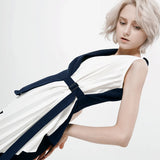 New Splicing Fold Design Irregular Hem Can Be Buckled Buckle Top Vest Coat Female