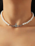 faux pearl necklace with planet