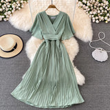summer new V neck short sleeved dress over the knee slim temperament waist tie big swing pleated Solid Color High