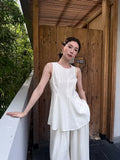 Xixi 2025 Summer New Temperament With The Silk Pure Color Thin Sleeveless Vest Shirt Lady