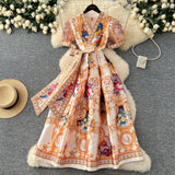 A Women's Court Style V Tie With A Belt Net Yarn Bubble Sleeve Print Large Swing Long Joint