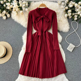 2022 Winter Knitted Pleated Dress Temperamant Bow Tie Long Sleeve Elastic Slim Female Solid Midi Long Sweater